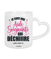 Mug Je suis une aide soignante qui déchire